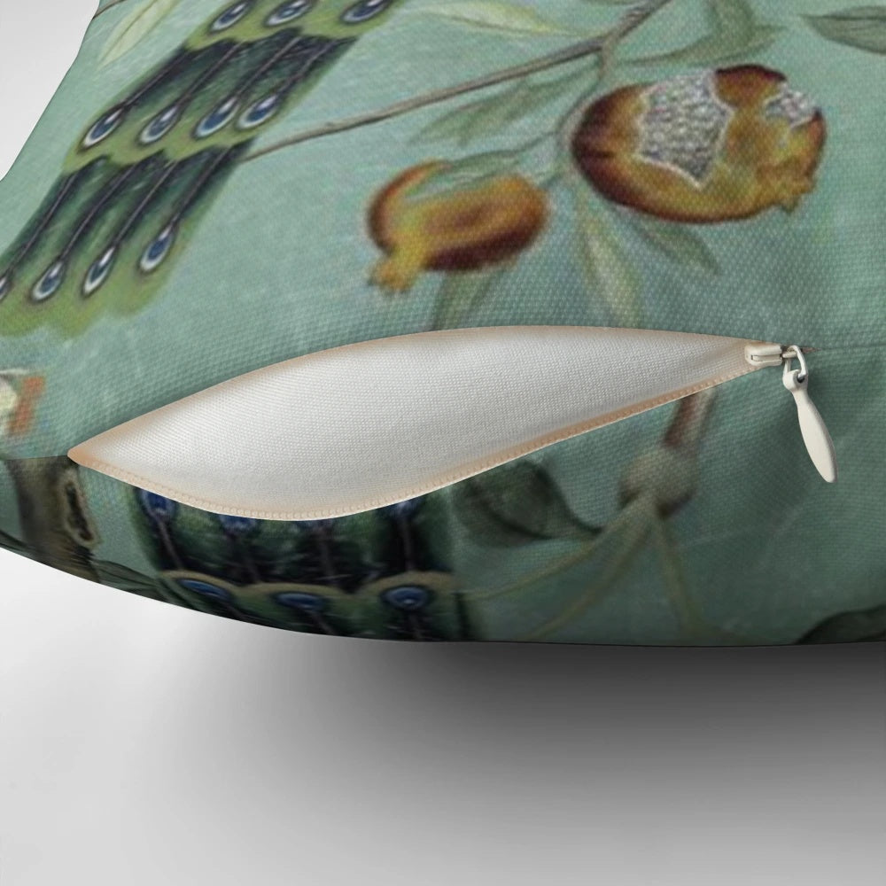 Teal and white chinoiserie-style pillow with illustrated birds, perfect for elegant and vintage-inspired home decor.