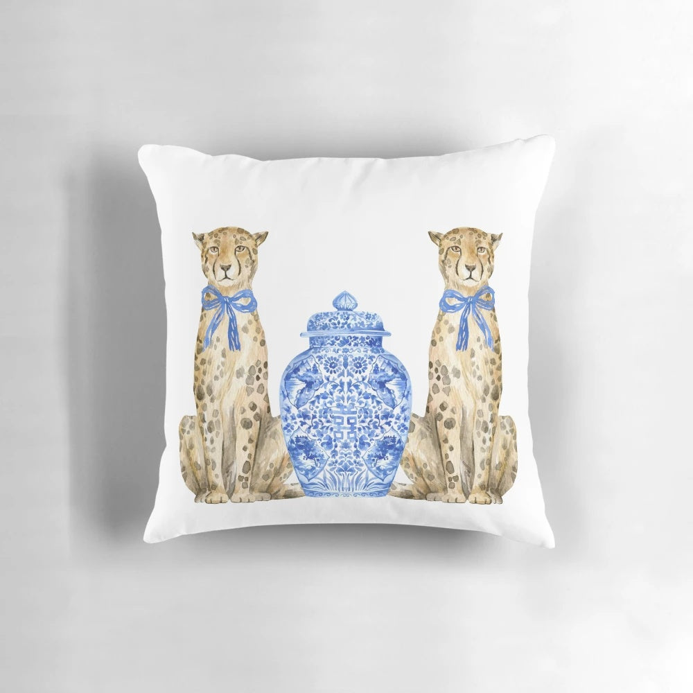 Decorative throw pillow featuring a chinoiserie-inspired leopard print design