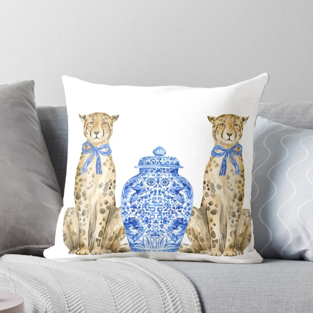 Decorative throw pillow featuring a chinoiserie-inspired leopard print design