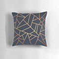 Copper and midnight navy decorative pillow with a modern geometric design
