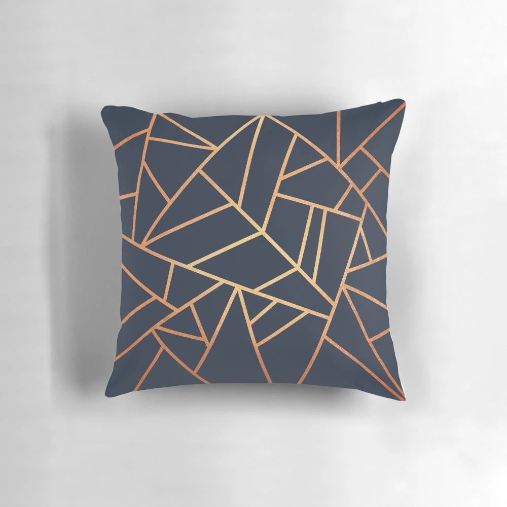 Copper and midnight navy decorative pillow with a modern geometric design