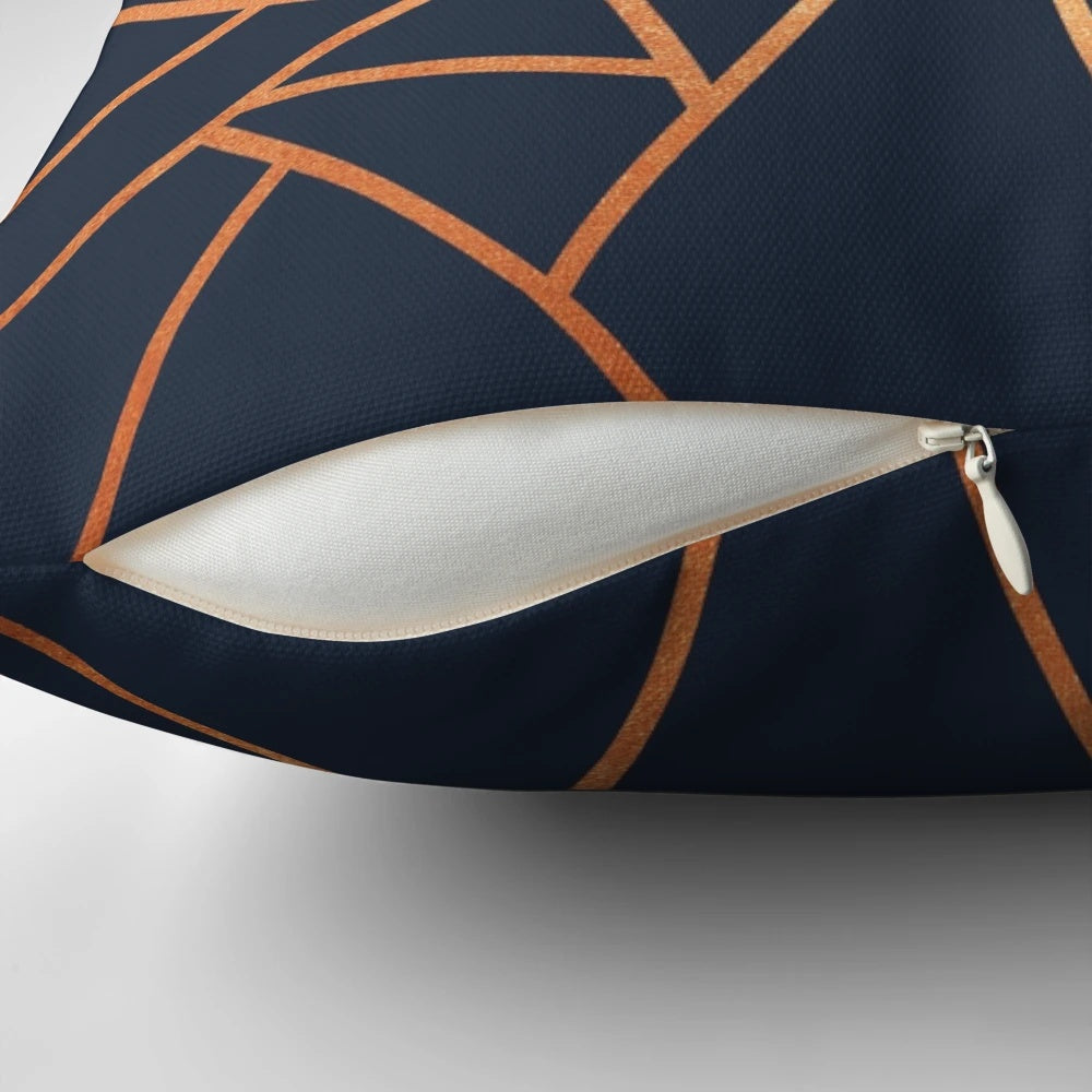 Copper and midnight navy decorative pillow with a modern geometric design