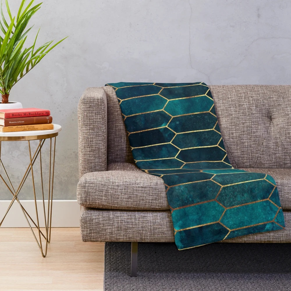 Deep teal and blue gold patterned plush blanket