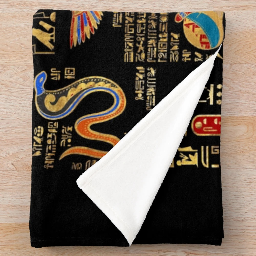 Plush black blanket with golden egyptian hieroglyphs and deities
