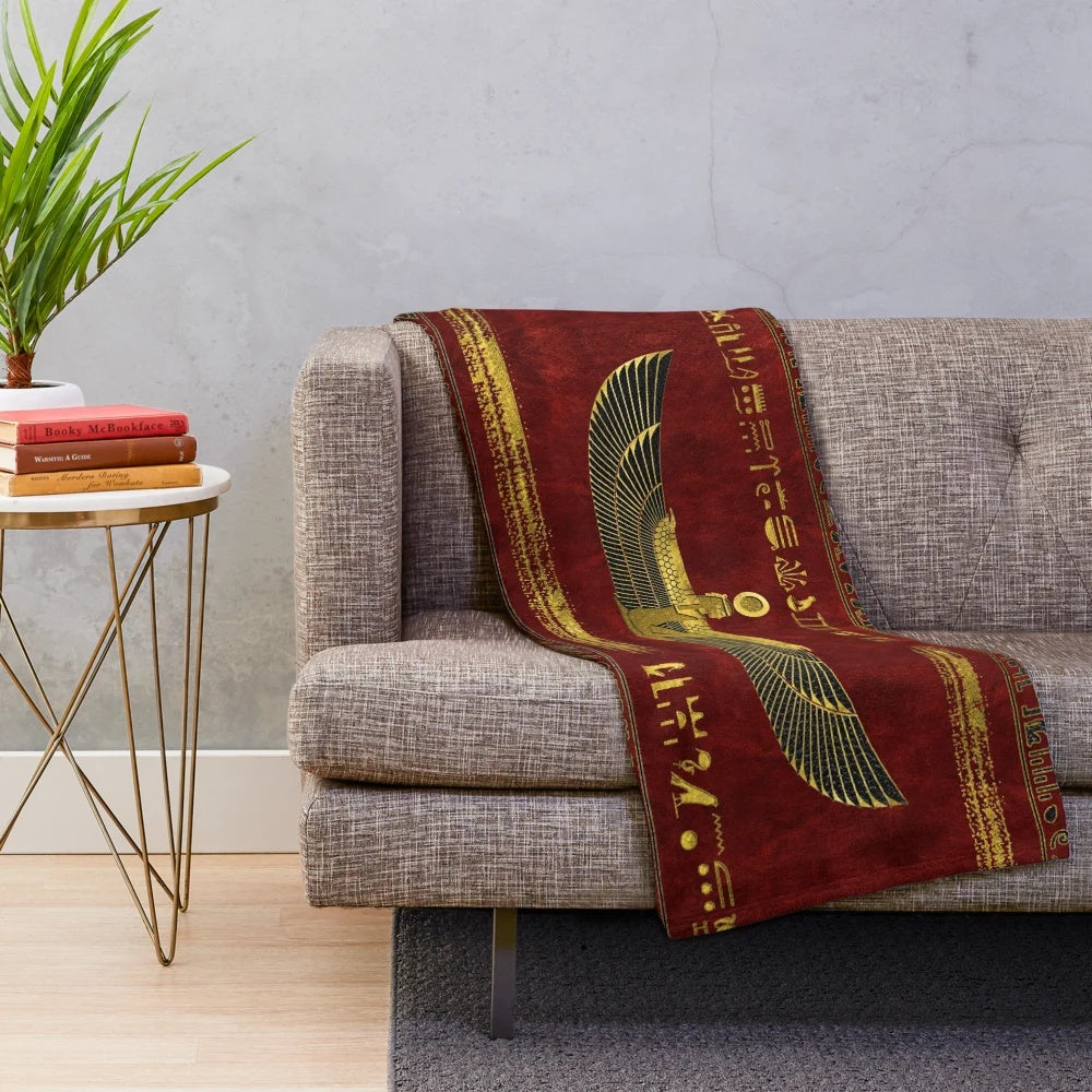 Plush blanket featuring an ancient Egyptian-inspired ornamental design