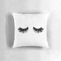 Soft, plush pillow featuring a delicate eyelash print design