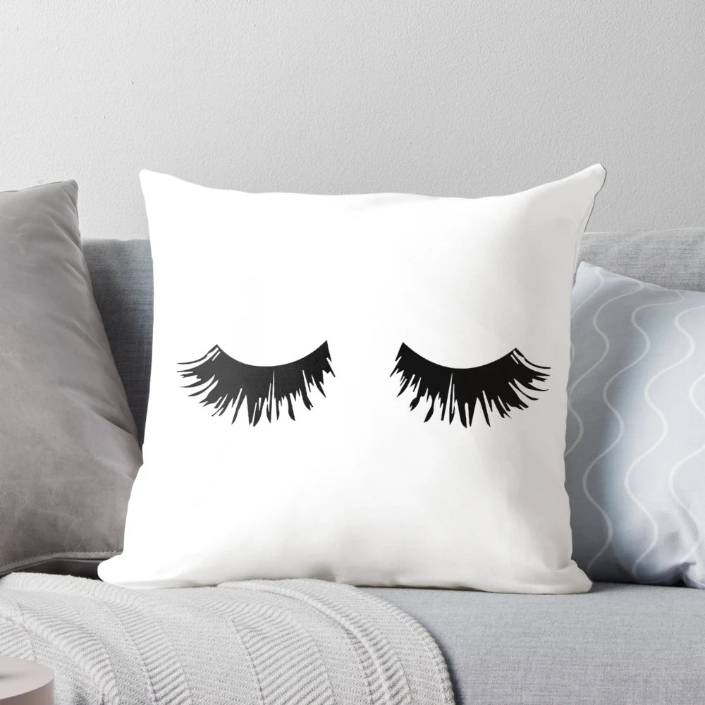 Soft, plush pillow featuring a delicate eyelash print design