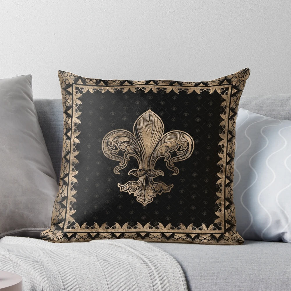 Black and gold fleur-de-lis inspired decorative pillow with a touch of vintage elegance.