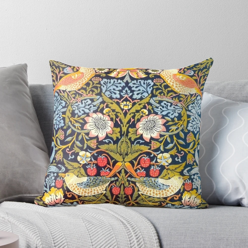 Decorative pillow featuring the iconic Strawberry Thief pattern designed by William Morris in 1883