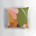 A stylish linen pillow featuring a vibrant floral and tropical leaf pattern, perfect for modern and boho-inspired home decor.