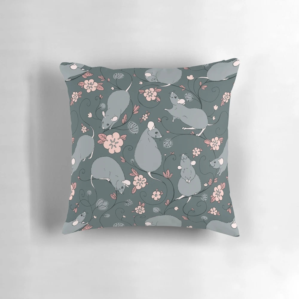 A decorative pillow featuring a floral pattern with a grey and pink color scheme, designed to appeal to pet rat owners and nature enthusiasts.