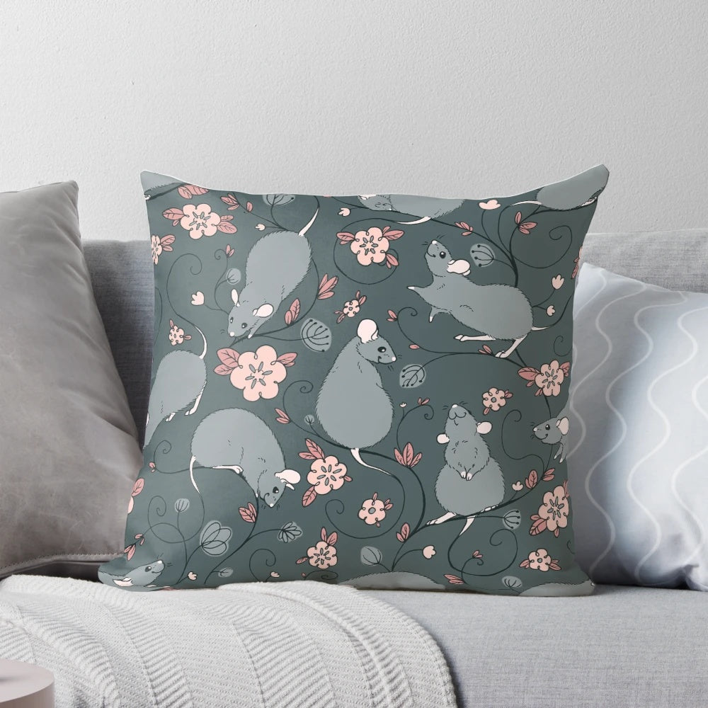A decorative pillow featuring a floral pattern with a grey and pink color scheme, designed to appeal to pet rat owners and nature enthusiasts.
