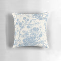 Decorative floral pillow with French Toile de Jouy inspired pattern in soothing blue hues