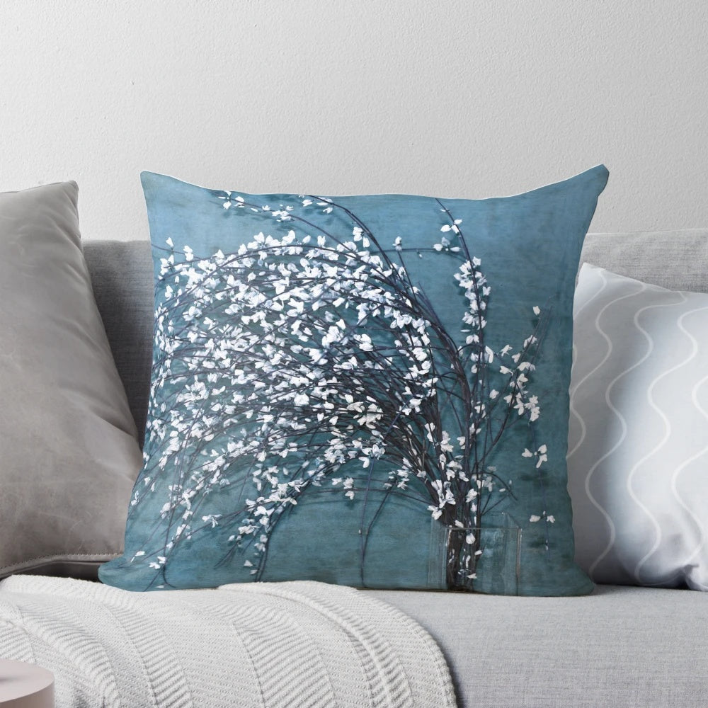 Vintage-style floral bouquet pillow in blue, white, and grey