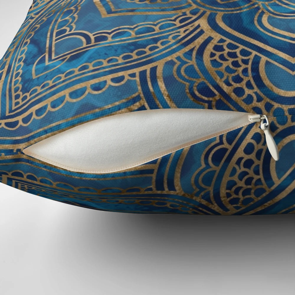 Decorative blue marble and gold pillow with a Flower of Life mandala design
