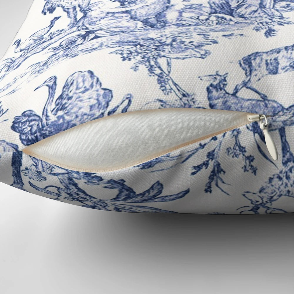 Elegant blue and white toile pattern pillow for French country-inspired home decor