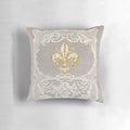 Closeup of a vintage-style grey and white floral lace decorative pillow
