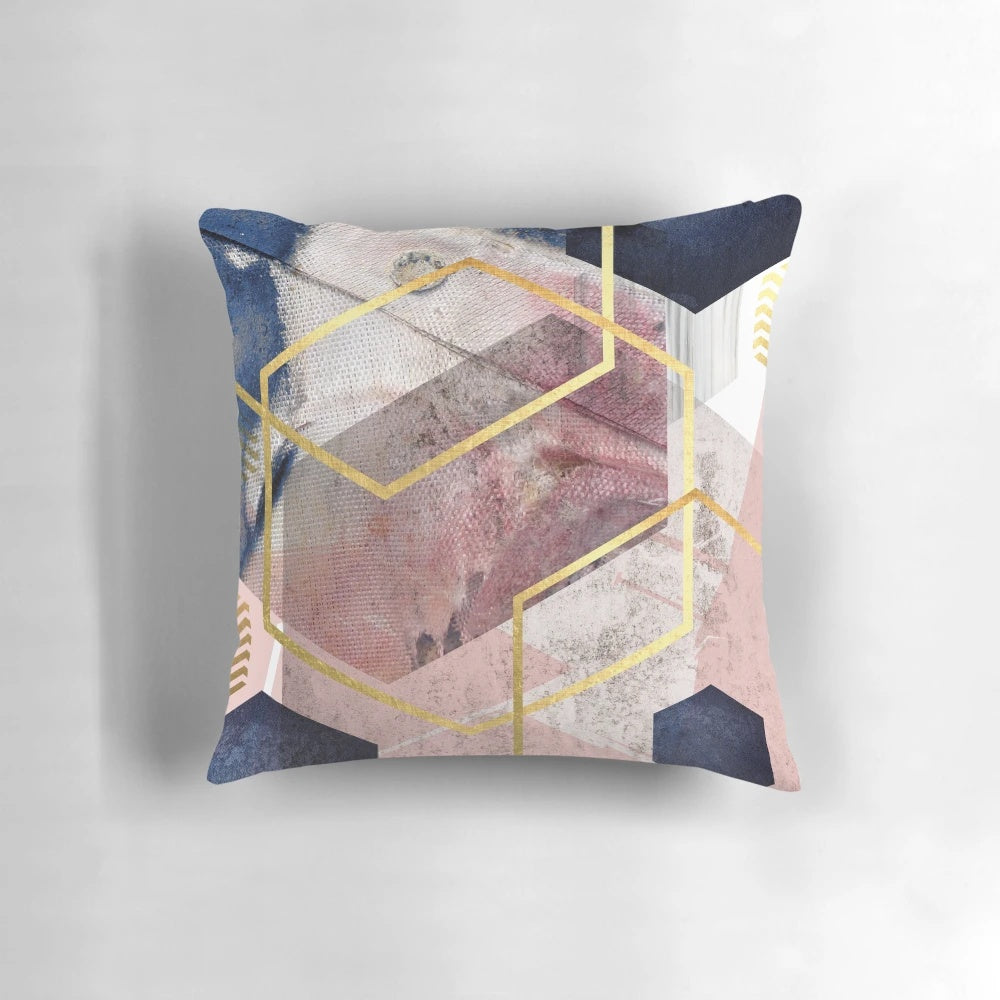 Plush abstract geometric art pillow in blush pink, navy blue, and gold colors