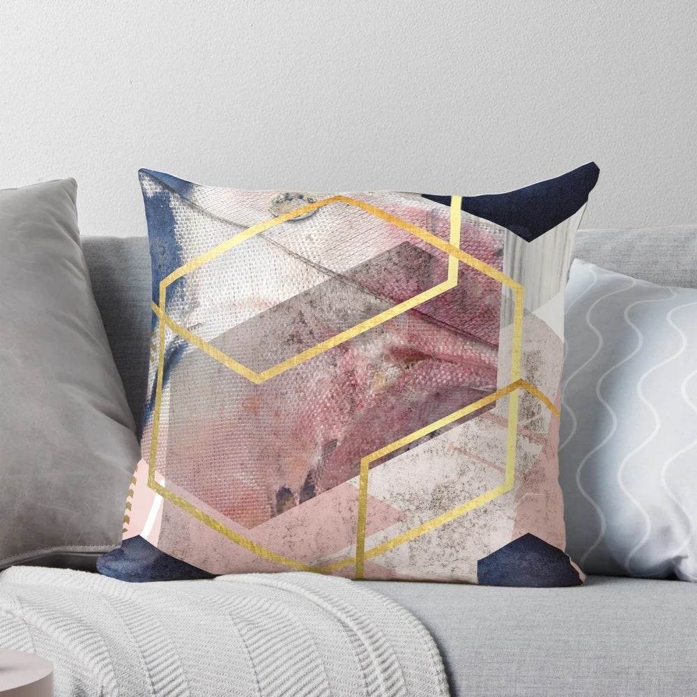 Plush abstract geometric art pillow in blush pink, navy blue, and gold colors