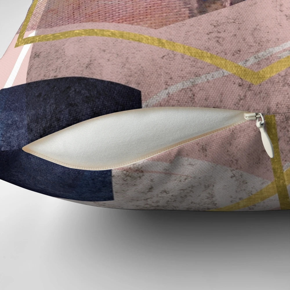 Plush abstract geometric art pillow in blush pink, navy blue, and gold colors