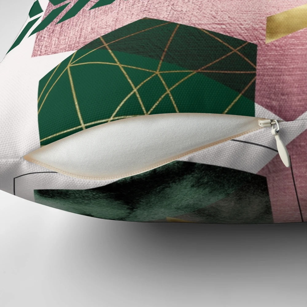 Elegant geometric pattern pillow in blush pink and emerald green shades