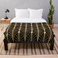 Sophisticated gold art deco pattern plush blanket