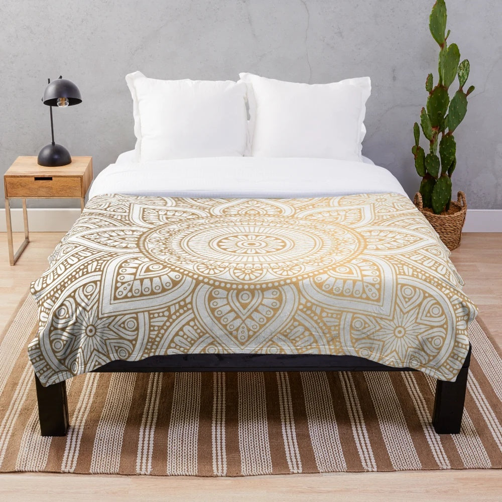 Gold mandala pattern plush blanket with shimmery abstract design