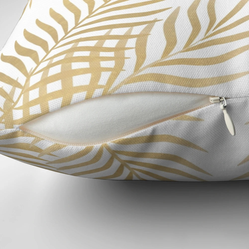 Gold palm leaves decorative pillow with tropical floral pattern