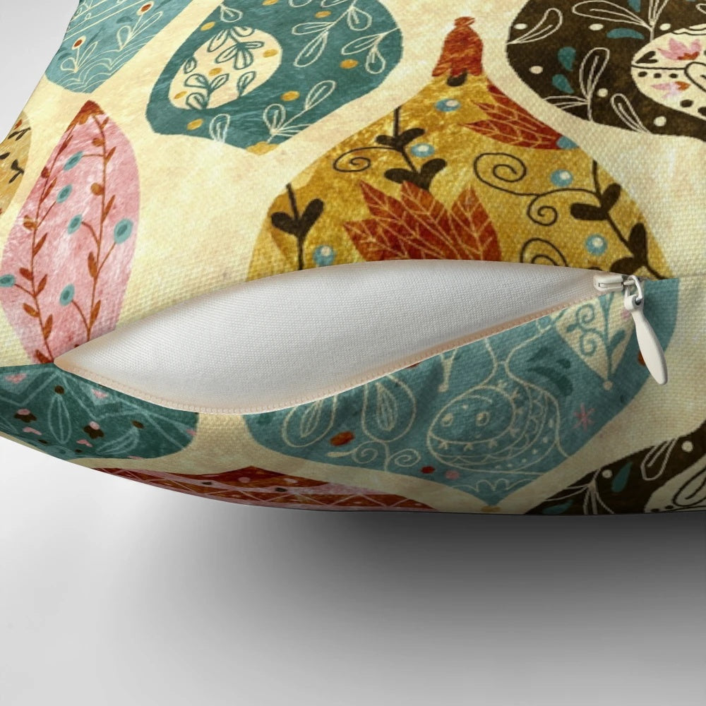 Gold and white patterned Christmas-themed decorative pillow