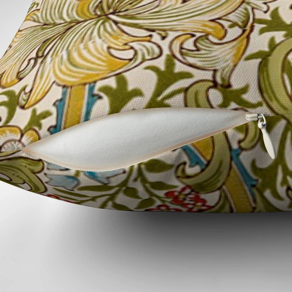 A decorative pillow featuring a golden lily flower pattern, inspired by the designs of the English Arts and Crafts movement.