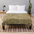 Golden lily floral pattern on a plush blanket