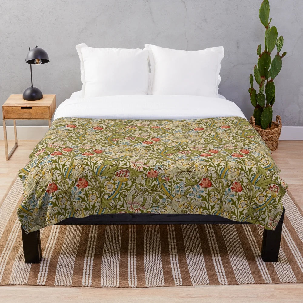 Golden lily floral pattern on a plush blanket
