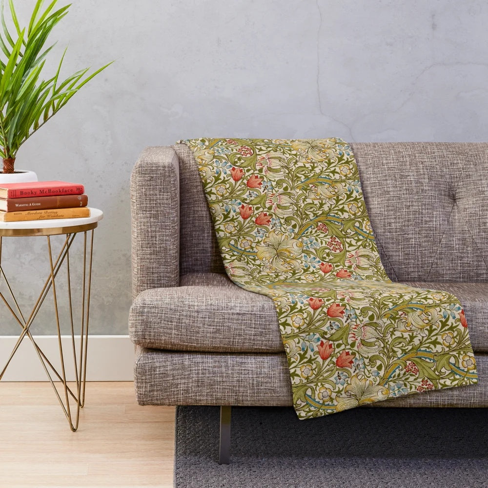 Golden lily floral pattern on a plush blanket