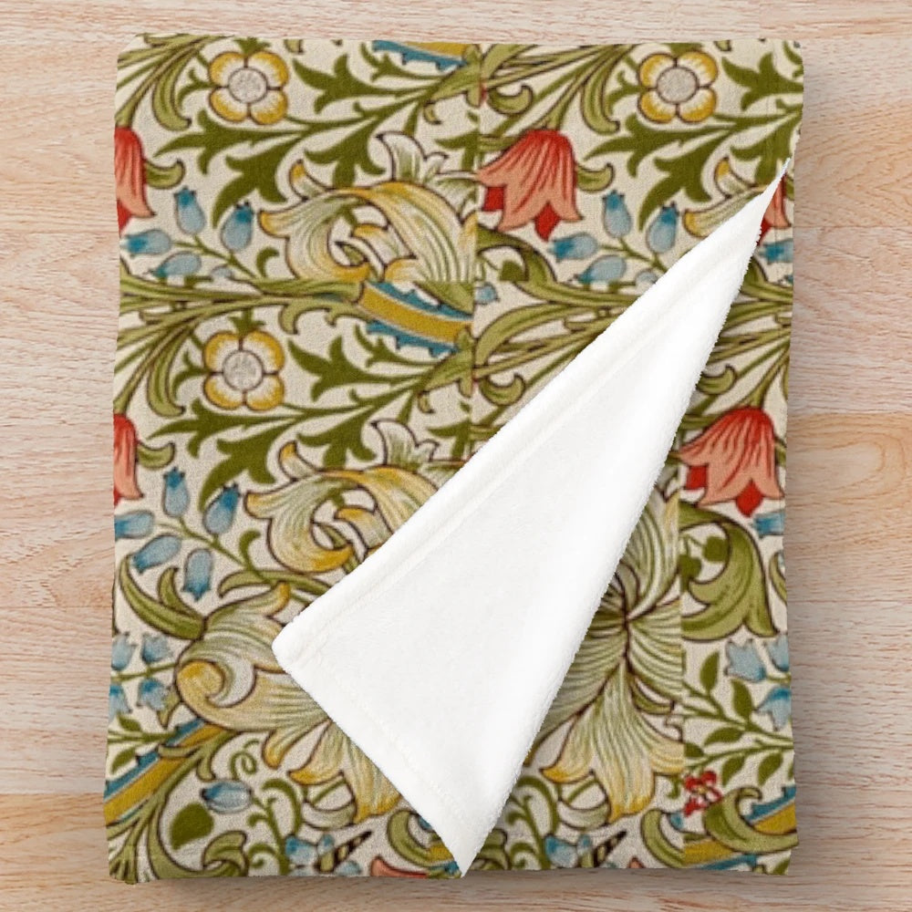 Golden lily floral pattern on a plush blanket