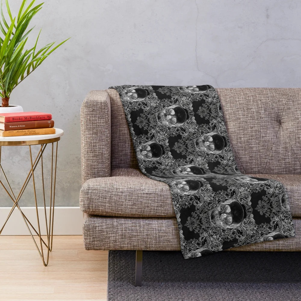 Damask skull pattern plush blanket in a gothic style