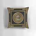 Black and gold decorative pillow with a Greek key meander pattern design
