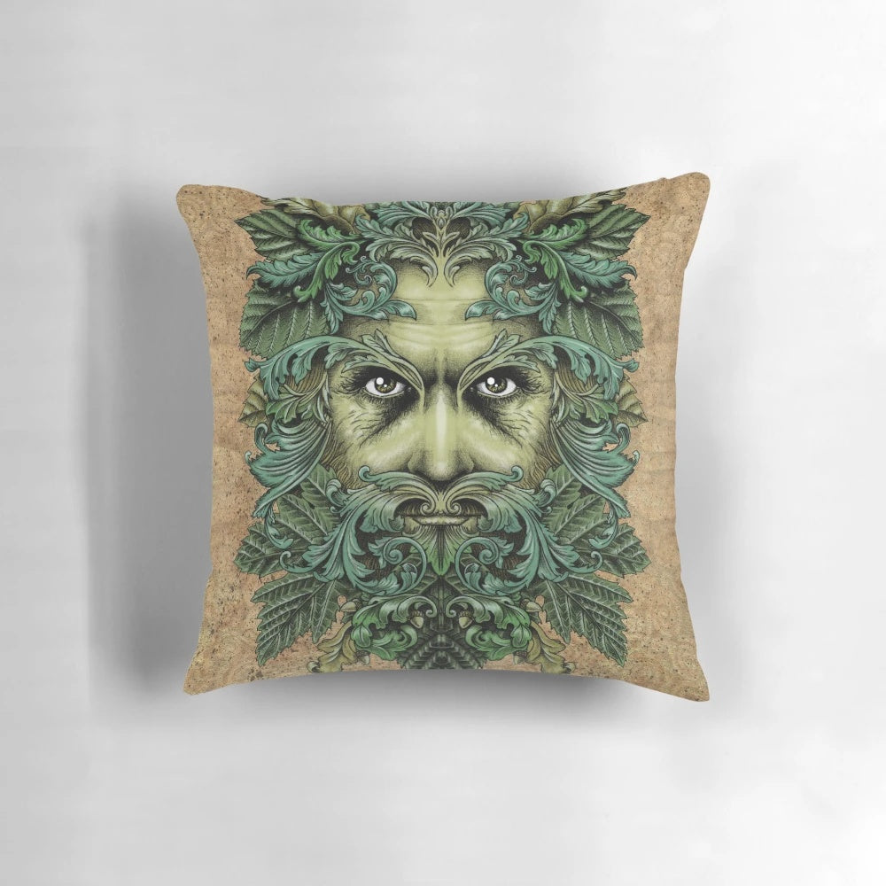 An ornate, fantasy-inspired pillow featuring the Green Man, a pagan nature deity surrounded by lush foliage and scrollwork.