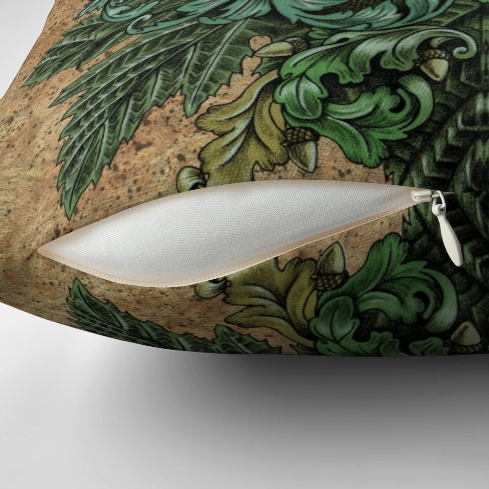 An ornate, fantasy-inspired pillow featuring the Green Man, a pagan nature deity surrounded by lush foliage and scrollwork.
