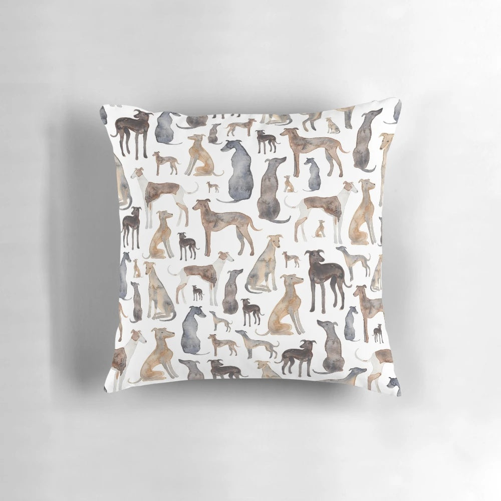 Decorative pillow featuring a watercolor pattern of greyhounds, lurchers, and wippets.