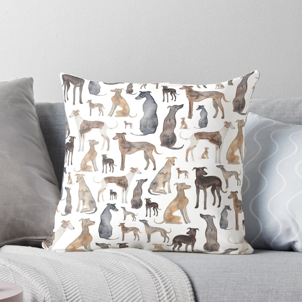 Decorative pillow featuring a watercolor pattern of greyhounds, lurchers, and wippets.
