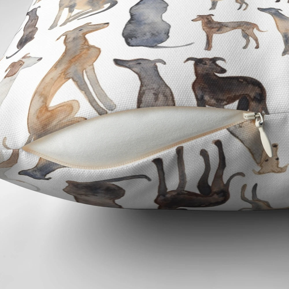 Decorative pillow featuring a watercolor pattern of greyhounds, lurchers, and wippets.
