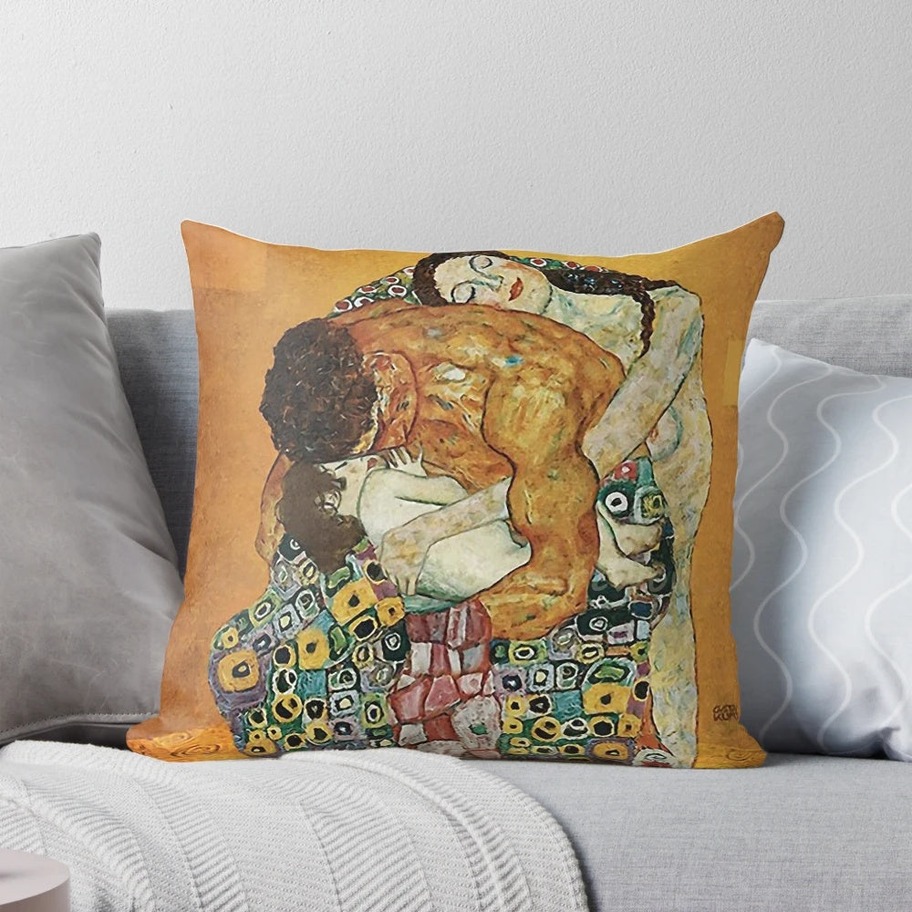 Decorative pillow featuring Gustav Klimt's iconic painting "The Family Embrace