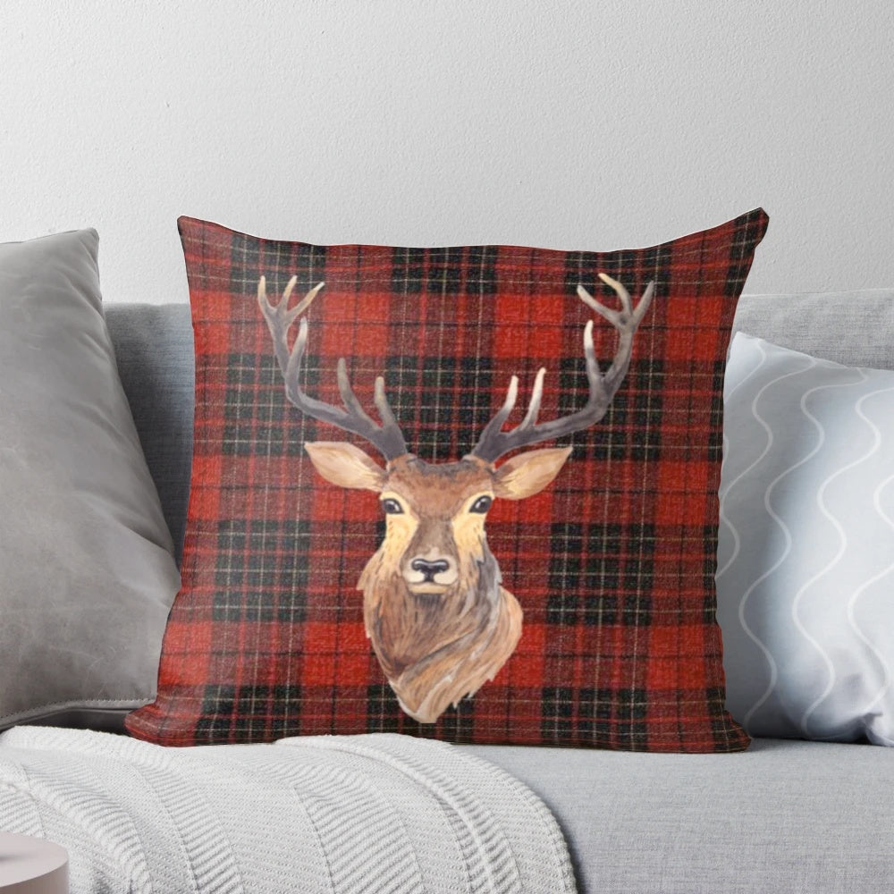 Closeup portrait of a majestic Highland stag with impressive antlers against a tartan background