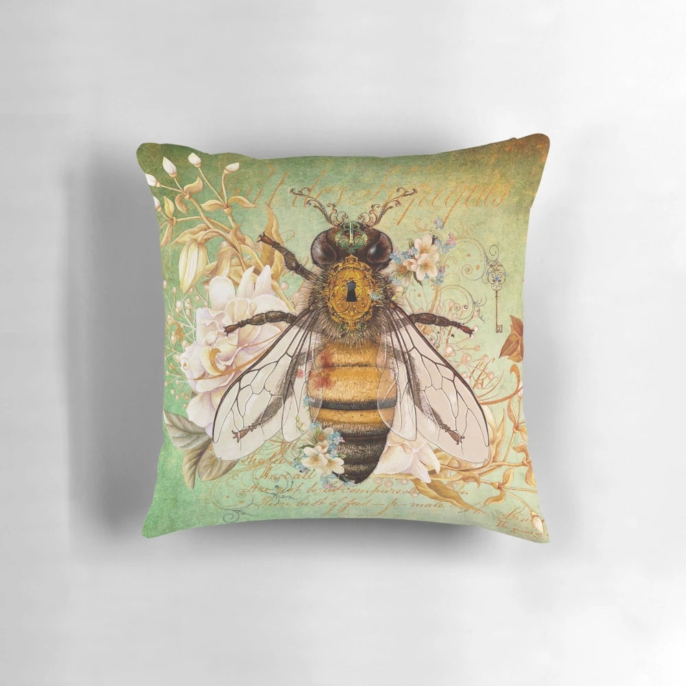 Elegant pillow featuring a honey bee and floral design