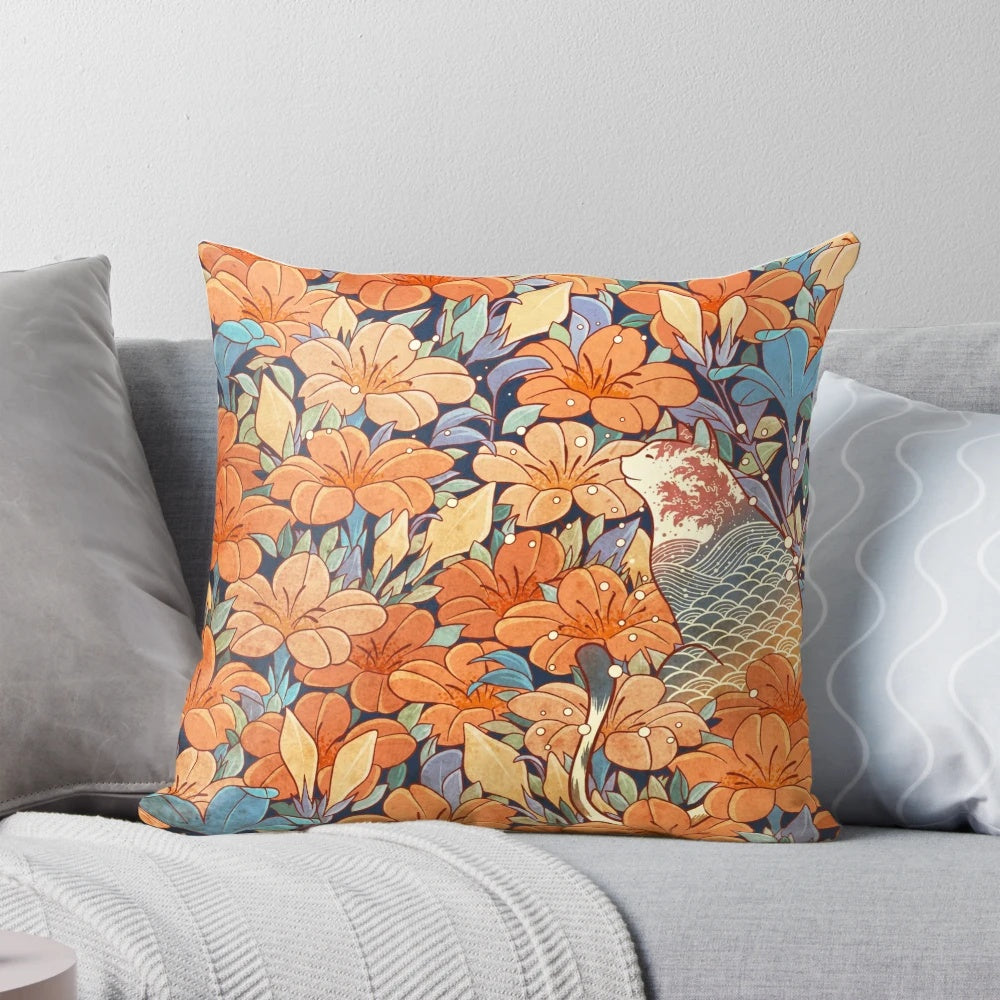 Decorative pillow featuring a beautifully illustrated Japanese cat surrounded by vibrant orange flowers and botanical elements.
