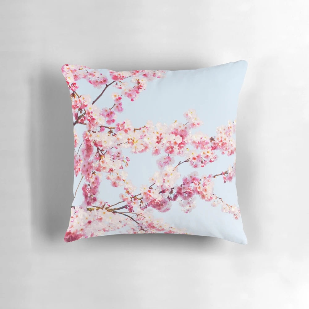 Vibrant Japanese cherry blossom design on a decorative pillow