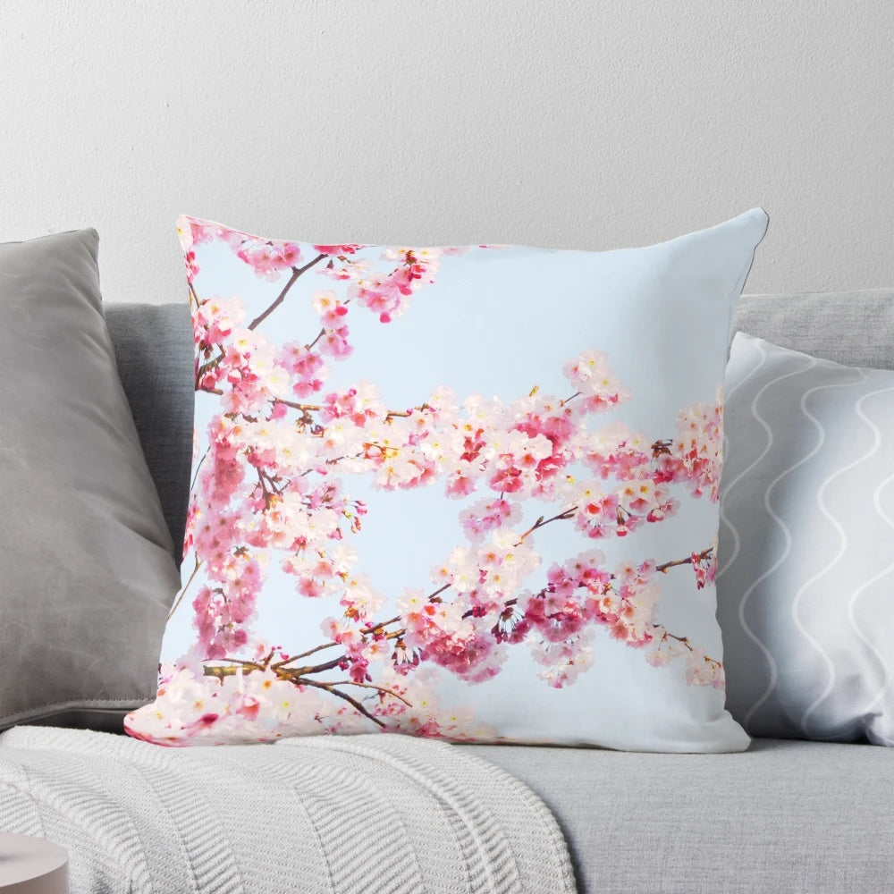 Vibrant Japanese cherry blossom design on a decorative pillow