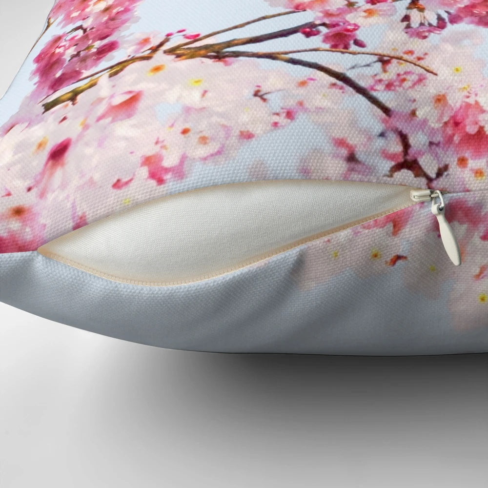 Vibrant Japanese cherry blossom design on a decorative pillow