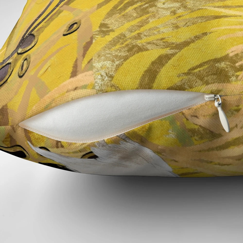 Closeup image of a traditional oriental pillow featuring a seamless pattern of golden Japanese cranes on a black background.