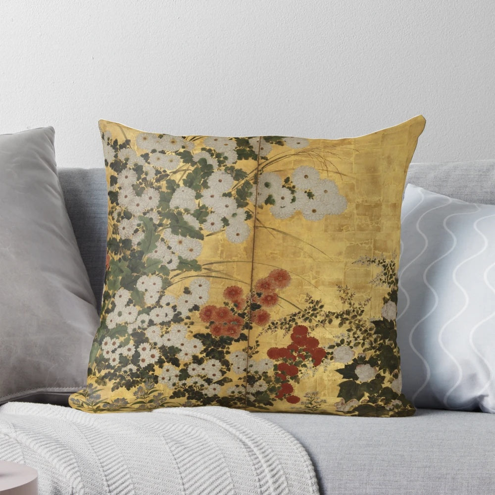 A beautiful white and red chrysanthemum floral print pillow with a vintage Japanese gold screen design.